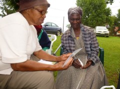 Sarah Mkhatswa is one of the gogos who received a hand delivered letter. It’s from her Vernon partner Sigrid-Ann, and is translated and read by Rosy Malulka