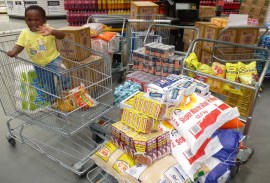 Shopping for 50 gogos fills four trolley wagons and two shopping carts